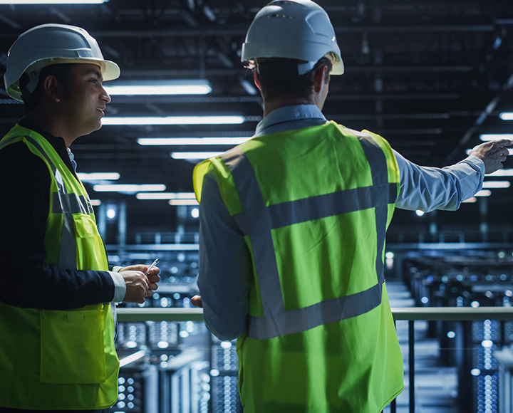 2 men on server room - Certifications and Audits for Information Technology Companies